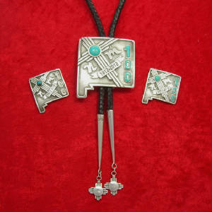 NM Pins Pendants/ NM 100 Centennial bolo and pin.jpg
